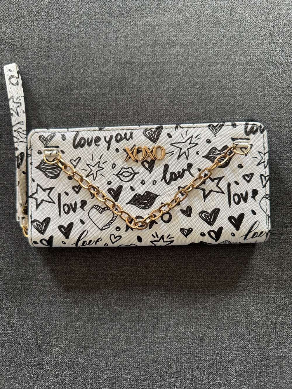 XOXO White and Black Graffiti-Print Wristlet with Gold Chain